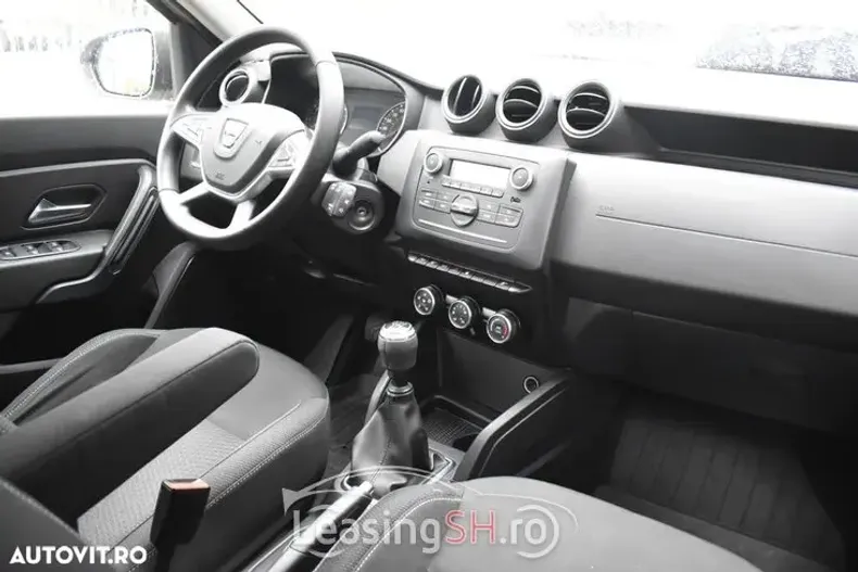 Dacia Duster din 2021 cu 88.446 km - oferta DAC100330 - foto 21